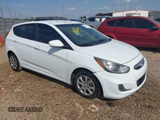 2014 Hyundai Accent GS with VIN KMHCT5AE6EU157751, listed as a IAAI auction lot 42161112 with 145,653 mi miles. Bid and sale history available at carsss.com. Image 1.