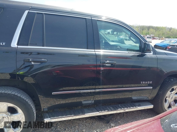 2018 Chevrolet Tahoe LT with VIN 1GNSKBKC7JR245565, listed as a IAAI auction lot 42097400 with 123,709 mi miles and . Bid and sale history available at DreamBid. Image 14.