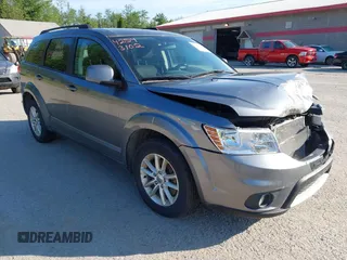 2013 Dodge Journey SXT with VIN 3C4PDDBGXDT607052, listed as a IAAI auction lot 42543102 with 157,325 mi miles and . Bid and sale history available at DreamBid. Image 1.