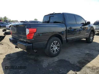 2024 Nissan Titan SV with VIN 1N6AA1EC2RN101063, listed as a Copart auction lot 49879235 with 12,418 mi miles and Salvage title. Bid and sale history available at DreamBid. Image 3.