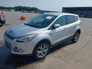 2013 Ford Escape SEL with VIN 1FMCU9H99DUA11243, listed as a IAAI auction lot 42356731 with 154,937 mi miles and . Bid and sale history available at DreamBid. Image 19.
