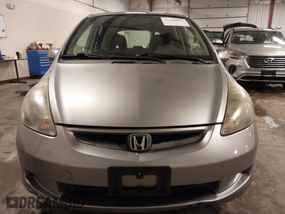 2007 Honda Fit with VIN JHMGD38417S045716, listed as a IAAI auction lot 42340897 with 63,765 mi miles and . Bid and sale history available at DreamBid. Image 13.