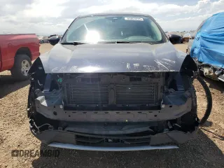 2021 Ford Escape SE with VIN 1FMCU9G66MUA94797, listed as a Copart auction lot 60864235 with 64,712 mi miles and Salvage title. Bid and sale history available at DreamBid. Image 5.