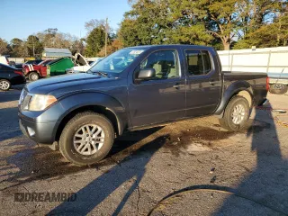 2014 Nissan Frontier S with VIN 1N6AD0ER3EN732226, listed as a Copart auction lot 87024024 with 105,921 mi miles and Salvage title. Bid and sale history available at DreamBid. Image 1.