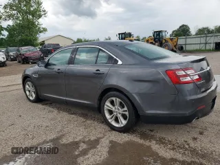 2015 Ford Taurus SEL with VIN 1FAHP2E82FG120607, listed as a Copart auction lot 59853315 with 172,812 mi miles and Salvage title. Bid and sale history available at DreamBid. Image 2.
