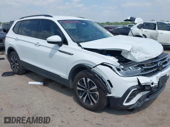 2024 Volkswagen Tiguan S with VIN 3VVRB7AXXRM105923, listed as a IAAI auction lot 42052697 with 18,421 mi miles and . Bid and sale history available at DreamBid. Image 1.