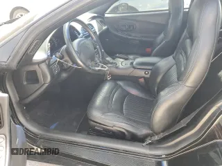2004 Chevrolet Corvette with VIN 1G1YY32G245117541, listed as a Copart auction lot 77487344 with 43,759 mi miles and Salvage Title. Bid and sale history available at carsss.com. Image 7.