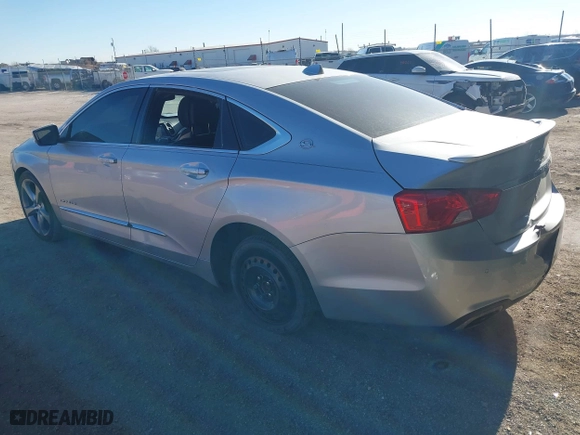 2014 Chevrolet Impala LTZ with VIN 2G1155S32E9282710, listed as a IAAI auction lot 41250424 with 154,486 mi miles. Bid and sale history available at carsss.com. Image 3.
