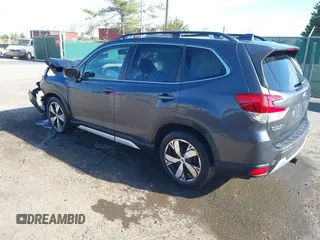 2020 Subaru Forester Touring with VIN JF2SKAXC0LH601036, listed as a IAAI auction lot 41911952 with 102,257 mi miles. Bid and sale history available at carsss.com. Image 3.