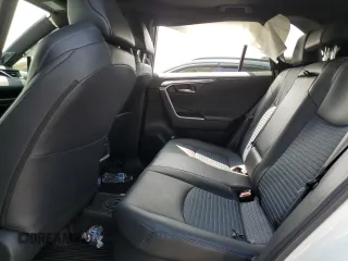 2023 Toyota RAV4 Hybrid XSE with VIN 2T3E6RFVXPW040152, listed as a Copart auction lot 61645565 with 26,408 mi miles and Salvage title. Bid and sale history available at DreamBid. Image 11.