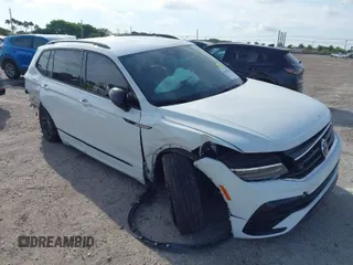 2022 Volkswagen Tiguan SE R-Line Black with VIN 3VVCB7AX5NM007401, listed as a IAAI auction lot 41630458 with 55,635 mi miles and . Bid and sale history available at DreamBid. Image 1.