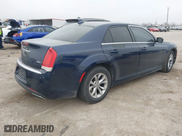 2015 Chrysler 300 Limited with VIN 2C3CCAAG5FH796498, listed as a IAAI auction lot 41520694 with 165,433 mi miles. Bid and sale history available at carsss.com. Image 4.