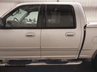 2003 Ford F-150 XLT with VIN 1FTRW08L83KA45989, listed as a IAAI auction lot 41048095 with 226,328 mi miles. Bid and sale history available at carsss.com. Image 15.