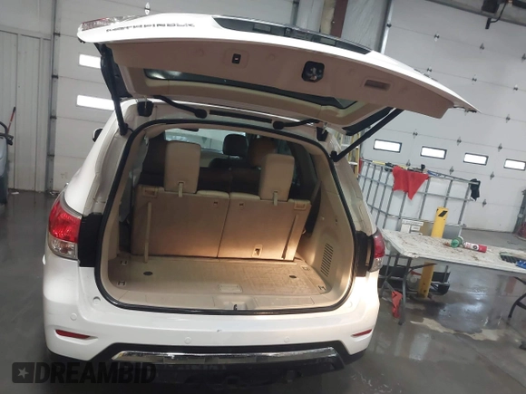 2014 Nissan Pathfinder Platinum with VIN 5N1AR2MM4EC603120, listed as a IAAI auction lot 41295992 with 130,117 mi miles and . Bid and sale history available at DreamBid. Image 12.