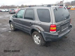 2002 Ford Escape XLT Choice with VIN 1FMYU04122KC36937, listed as a IAAI auction lot 42014887 with 141,885 mi miles. Bid and sale history available at carsss.com. Image 3.