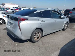 2016 Toyota Prius Two with VIN JTDKBRFU7G3527057, listed as a IAAI auction lot 41638241 with 226,273 mi miles. Bid and sale history available at carsss.com. Image 4.