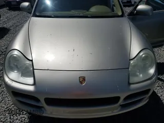 2004 Porsche Cayenne S z VIN WP1AB29P94LA75826, wystawiony jako Copart lot #57920545 z przebiegiem 193 245 mil mil oraz Szkody całkowita. Historia ofert i sprzedaży dostępna na DreamBid. Obrazek 12.