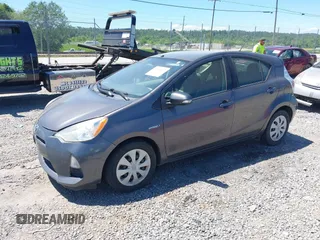 2012 Toyota Prius One z VIN JTDKDTB38C1013132, wystawiony jako IAAI lot #42345947 z przebiegiem 257 153 mil mil oraz . Historia ofert i sprzedaży dostępna na DreamBid. Obrazek 2.