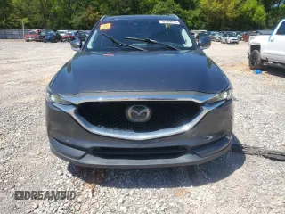 2018 Mazda CX-5 Grand Touring with VIN JM3KFADM9J0343621, listed as a Copart auction lot 52284475 with 129,776 mi miles and Salvage Title. Bid and sale history available at DreamBid. Image 5.