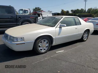 2001 Cadillac Eldorado ESC with VIN 1G6EL12Y61B109528, listed as a Copart auction lot 62088445 with 140,743 mi miles and Clean title. Bid and sale history available at DreamBid. Image 1.