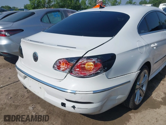2012 Volkswagen CC Sport with VIN WVWMP7AN7CE504553, listed as a IAAI auction lot 42469902 with 141,634 mi miles and . Bid and sale history available at DreamBid. Image 6.