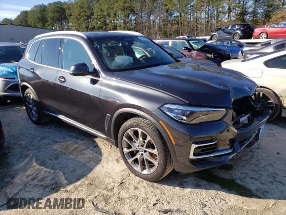 2022 BMW X5 xDrive40i with VIN 5UXCR6C08N9L71412, listed as a Copart auction lot 71472332 with 8,977 mi miles and . Bid and sale history available at DreamBid. Image 4.