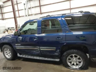 2003 Chevrolet Tahoe LS with VIN 1GNEK13Z03J303284, listed as a IAAI auction lot 41795469 with 242,018 mi miles. Bid and sale history available at carsss.com. Image 14.