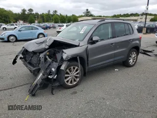 2015 Volkswagen Tiguan SE z VIN WVGBV7AX9FW512193, wystawiony jako Copart lot #57666475 z przebiegiem 124 463 mil mil oraz Czysty tytuł • Clean title. Historia ofert i sprzedaży dostępna na DreamBid. Obrazek 1.