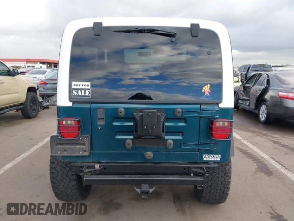 1998 Jeep Wrangler Sport with VIN 1J4FY19S7WP787679, listed as a IAAI auction lot 41764883 with 134,144 mi miles. Bid and sale history available at carsss.com. Image 16.