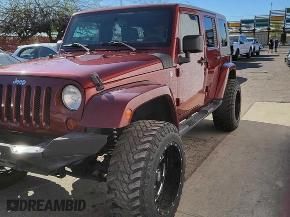 2010 Jeep Wrangler Unlimited Sahara with VIN 1J4BA5H10AL117474, listed as a Copart auction lot 51196435 with 131,256 mi miles and Clean Title. Bid and sale history available at carsss.com. Image 2.
