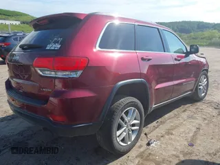 2018 Jeep Grand Cherokee Altitude with VIN 1C4RJFAGXJC280612, listed as a IAAI auction lot 42388185 with 103,305 mi miles and . Bid and sale history available at DreamBid. Image 4.