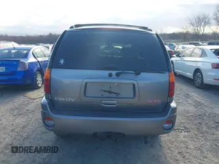 2005 GMC Envoy SLE with VIN 1GKDT13S852362380, listed as a IAAI auction lot 42031727 with 76,711 mi miles. Bid and sale history available at carsss.com. Image 17.