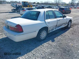 1999 Mercury Grand Marquis GS z VIN 2MEFM74W0XX686623, wystawiony jako IAAI lot #41828993 z przebiegiem 245 171 mil mil oraz . Historia ofert i sprzedaży dostępna na DreamBid. Obrazek 4.