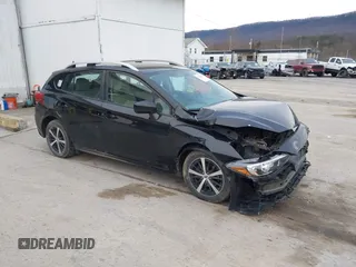 2019 Subaru Impreza Premium with VIN 4S3GTAC65K3733805, listed as a IAAI auction lot 41904014 with 73,805 mi miles. Bid and sale history available at carsss.com. Image 1.