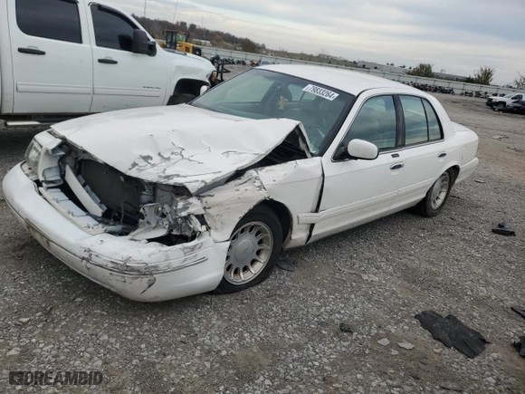 2000 Ford Crown Victoria LX with VIN 2FAFP74W4YX120352, listed as a Copart auction lot 79833264 with 0 mi miles and Salvage Title. Bid and sale history available at carsss.com. Image 1.