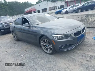 2018 BMW 4 Series 430i xDrive with VIN WBA4J3C57JBG91928, listed as a IAAI auction lot 42699996 with 147,351 mi miles and . Bid and sale history available at DreamBid. Image 1.