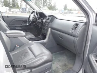 2003 Honda Pilot EX z VIN 2HKYF18613H510512, wystawiony jako IAAI lot #41766690 z przebiegiem 234 023 mil mil oraz . Historia ofert i sprzedaży dostępna na DreamBid. Obrazek 5.