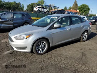 2018 Ford Focus SE with VIN 1FADP3F26JL278091, listed as a Copart auction lot 63879875 with 81,984 mi miles and Clean title. Bid and sale history available at DreamBid. Image 1.