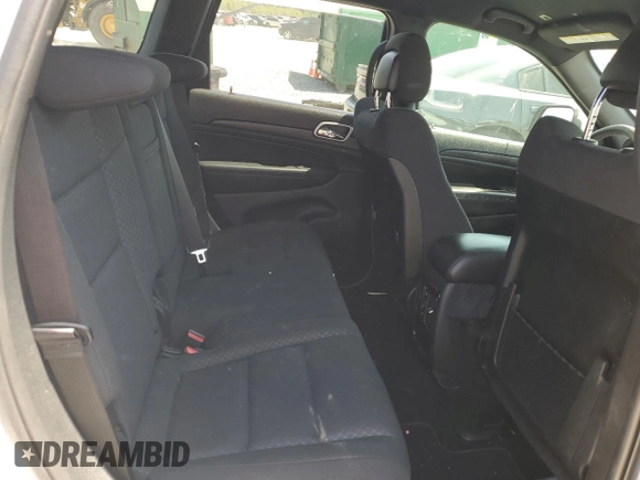 2019 Jeep Grand Cherokee Altitude with VIN 1C4RJEAG9KC662240, listed as a Copart auction lot 52871935 with 123,188 mi miles and Salvage title. Bid and sale history available at DreamBid. Image 11.