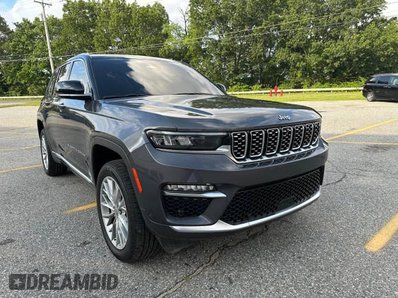 2023 Jeep Grand Cherokee Summit with VIN 1C4RJHEG2P8882566, listed as a Copart auction lot 65095905 with 59,970 mi miles and Salvage title. Bid and sale history available at DreamBid. Image 2.