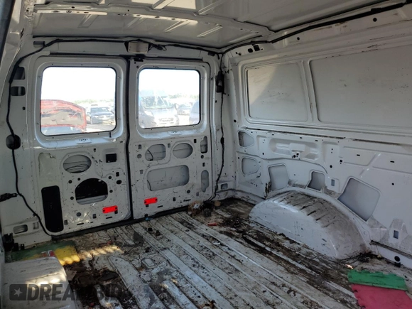 2012 Ford Econoline Cargo Commercial with VIN 1FTNE2EL0CDB33215, listed as a Copart auction lot 63120784 with 258,466 mi miles and Salvage title. Bid and sale history available at DreamBid. Image 11.