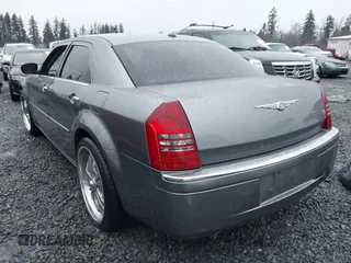 2006 Chrysler 300 C with VIN 2C3KA63H06H286676, listed as a IAAI auction lot 41231230 with 134,565 mi miles. Bid and sale history available at carsss.com. Image 3.