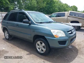 2009 Kia Sportage LX z VIN KNDJF724X97574931, wystawiony jako IAAI lot #42443517 z przebiegiem 163 142 mil mil oraz . Historia ofert i sprzedaży dostępna na DreamBid. Obrazek 1.