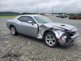 2015 Dodge Challenger SXT with VIN 2C3CDZAG5FH733851, listed as a Copart auction lot 52095025 with 169,150 mi miles and Salvage Title. Bid and sale history available at carsss.com. Image 4.