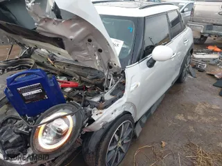 2019 MINI Hardtop 4 Door Cooper S with VIN WMWXU3C59K2H87159, listed as a IAAI auction lot 41225965 with 76,640 mi miles. Bid and sale history available at carsss.com. Image 2.