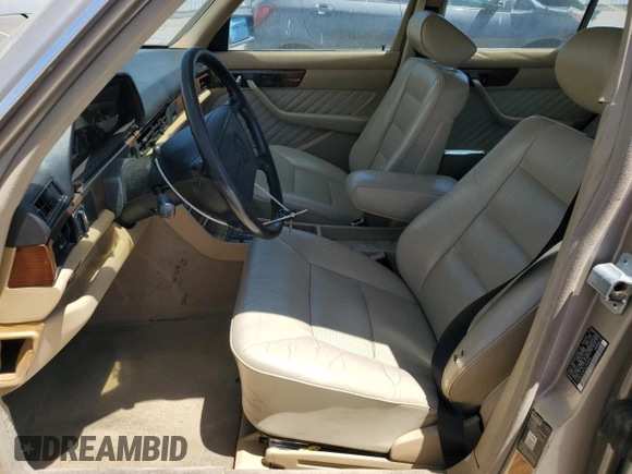 1990 Mercedes-Benz 300 with VIN WDBCA24D1LA529716, listed as a Copart auction lot 56581335 with 122,286 mi miles and Salvage Title. Bid and sale history available at DreamBid. Image 7.