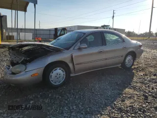 1999 Mercury Sable LS Premium Group z VIN 1MEFM53S2XA624846, wystawiony jako Copart lot #45975785 z przebiegiem 134 291 mil mil oraz Szkody całkowita. Historia ofert i sprzedaży dostępna na DreamBid. Obrazek 1.