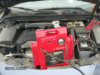 2015 Chevrolet Malibu LT z VIN 1G11C5SL4FF336734, wystawiony jako IAAI lot #43313686 z przebiegiem 234 138 mil mil oraz . Historia ofert i sprzedaży dostępna na DreamBid. Obrazek 12.