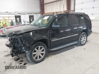 2013 GMC Yukon Denali with VIN 1GKS2EEF0DR105804, listed as a IAAI auction lot 42028402 with 121,054 mi miles. Bid and sale history available at carsss.com. Image 2.