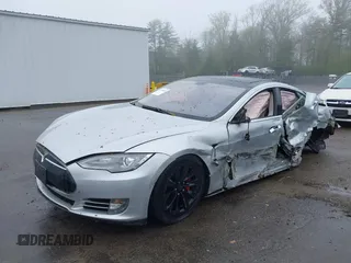 2014 Tesla Model S 60 with VIN 5YJSA1H18EFP30143, listed as a IAAI auction lot 42190505 with Not provided miles and . Bid and sale history available at DreamBid. Image 2.